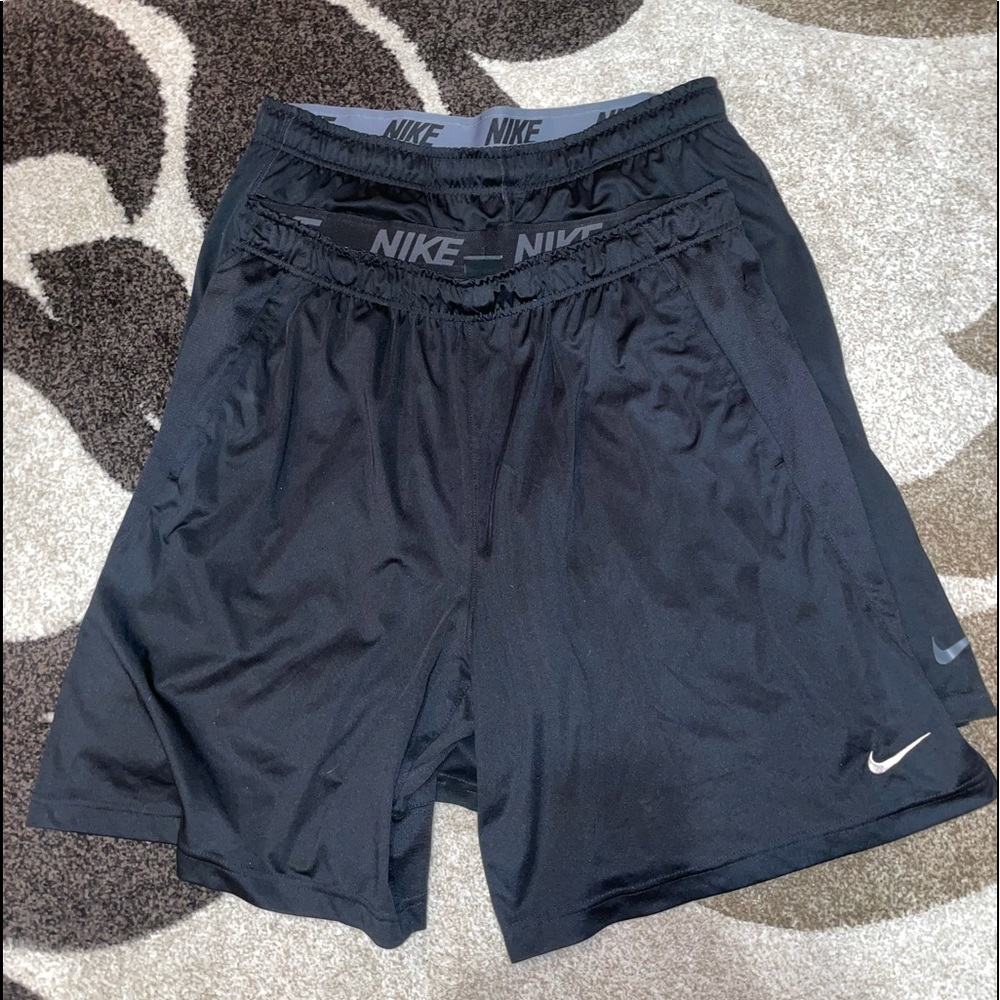 TWO PAIRS OF NIKE DRI FIT